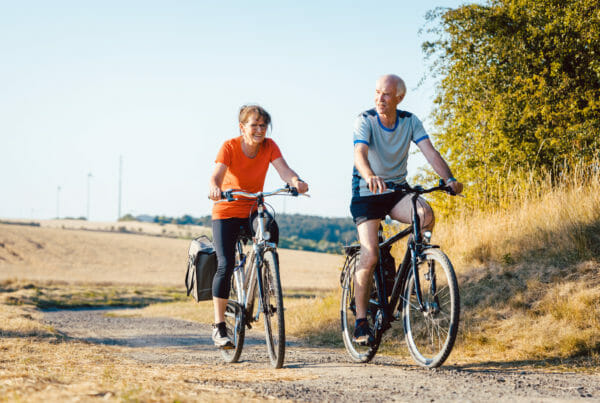 Senior couple riding their bicycles for better fitness